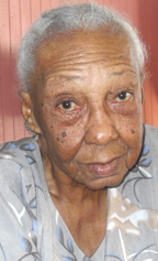 88-year-old Iris Charles sits calmly and reminisced about her past. - iris-charles