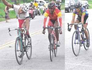 Sprint King Alonzo Greaves (left) raises his hand in triumph as he crosses the line ahead of Robin Persuad on Homestretch Avenue yesterday. Paul De Nobrega (right) won the junior race. (Franklin Wilson photo)