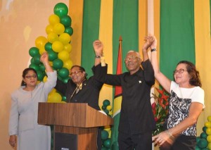 Prime Ministerial Candidate, Moses Nagamootoo [left) joined by his wife and Presidential Candidate, David Granger and his wife( right) as they dance to Bob Marley’s ‘One Love’ anthem 