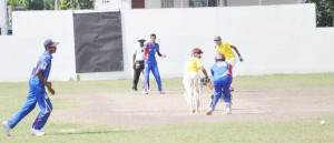  Bhojnarine Singh turns Gauranshu Shamara (4-31) past the Keeper in his match winning last wicket stand for East Bank yesterday at DCC.