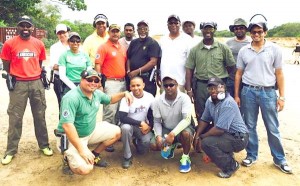 Dr. Johan DaSilva (stooping left) and other competitors following Sunday’s shoot.