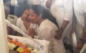 Grief stricken relatives take a final view at the body of Ganesh ‘Boyo’ Ramlall