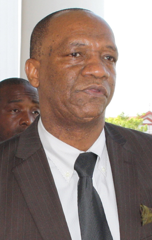 Minister of State, Joseph Harmon 