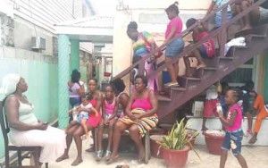 Small’s relatives gathered at his home yesterday 