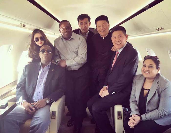 Harmon and the Chu family on a private jet.