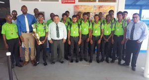 Members of the victorious Guyana U19 team shortly after arriving at the Eugene F. Correira International airport, Ogle with Director of Sport Christopher Jones [3rd from left) and officials of the GCB. (Zaheer Mohamed photo)
