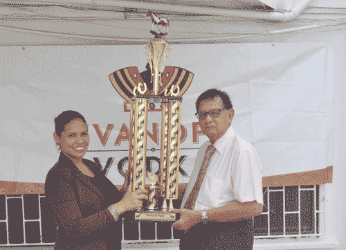 http://www.kaieteurnewsonline.com/images/2016/09/Justice-Cecil-Kennard-receives-the-Feature-race-trophy-from-Maria-Munroe-DDLs-Brand-Manager-Wines-Spirts-yesterday.gif