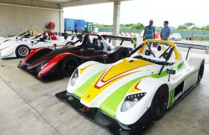 Suzuki motors to be used by Krisitan Jeffrey, Mark Vieira and Calvin Ming on display yesterday. [Bushy Park Barbados facebook)
