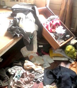 A section of the ransacked bedroom