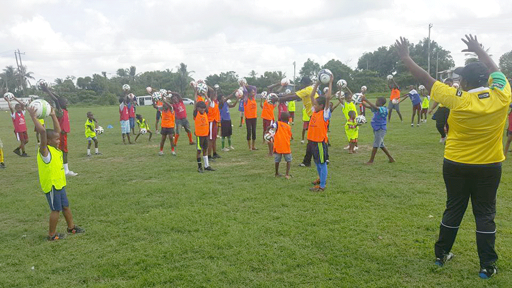 http://www.kaieteurnewsonline.com/images/2016/11/Players-being-taken-through-some-exercises-by-the-facilitators-of-the-GFF-Grass-Roots-Festival-at-the-Grove-Playfield-on-Saturday-last-1..gif