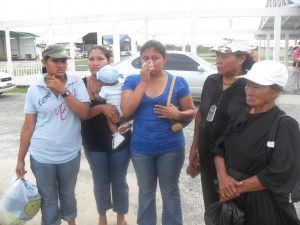 The dead man’s relatives, including his mother, Doreen Larson,  (second from right) at the Ogle Aerodrome yesterday 