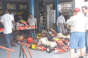 A number of enthusiasts along with members of the GMR&SC take a closer look at the karts yesterday. 