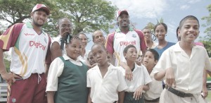 Sarwan and Gayle with Special Needs kids at the  Digicel Cricket Experience in Georgetown, Guyana