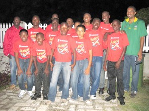 Members of the Hikers junior squad pose for a picture.  At right is Coach Timothy McIntosh.