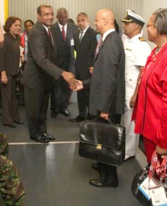President Jagdeo is welcomed by Trinidadian officials on arrival at Piarco.