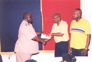 Federal Management Systems Inc. (FMS) recently made a monetary donation to the Guyana Police Force to assist with the hosting of the 24th Conference and Annual General Meeting of the Association of Caribbean Commissioners of Police (ACCP) which will be held in Guyana from May 11-15.  In photo, Commissioner Henry Greene is seen receiving the cheque from FMS General Manager Mr. Terrence McKenzie, while FMS Programme Manager Mr. Lennox Mollyneaux looks on.