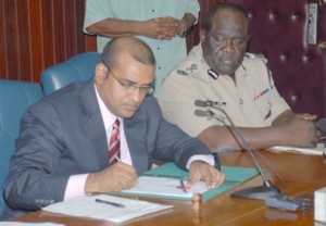 President Bharrat Jagdeo assenting to the Evidence, Motor Vehicle and Road Traffic Amendment Bill, yesterday.