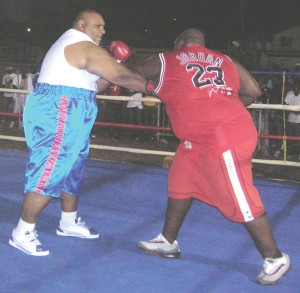 Super, super heavyweights, Fahaad Ali (left) and Shawn Harris go after each other in their action packed affair.