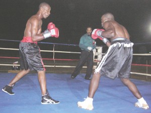 Leon Moore (left) prepares to launch one of his attacks on Mark Murray.
