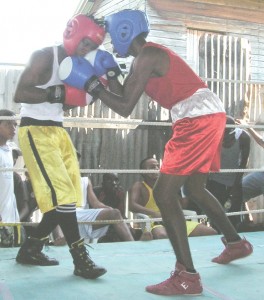 Part of the action between Andrew Davis (left) and Rondell Singh at the Harpy Eagle’s Boxing Gym yesterday afternoon.