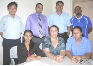 Members of the Guyana Motor Racing & Sports Club pose for a Kaieteur Sport photo (standing from left) John Chin, Peter Peroune, Aaron Bethune (President) and Hansraj Singh, while those sitting are (from left) Rakhee Dharmo, Debbie Phillipe and Krista Prasad.