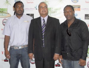 Ready for four days of excitement: L-R H&J CEO  Rawle Ferguson, Tourism Minister Manniram Prashad and  Entertainer Kerwin Bollers at the Tourism Ministry yesterday.