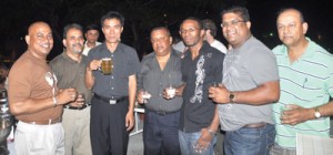 Some members of the Guyana Watch team at a farewell reception hosted by the New Thriving Restaurant, last evening. At left is Kaieteur News publisher Glenn Lall. Third from left is New Thriving owner Peter Xia, while forth from left is Tony Yassin, President of Guyana Watch.   