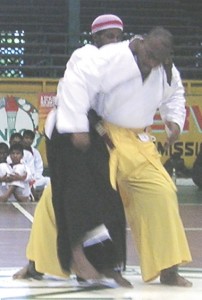 Master John Prescod (right) demonstrates the technique employed to escape from a ‘Full Nelson’ hold during yesterday’s sessions.