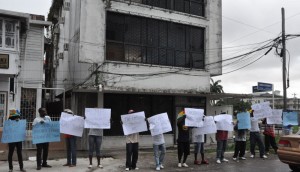 The group of picketers outside Ramjattan’s Law Offices yesterday