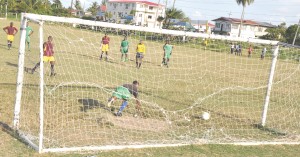 Riddim Squad’s Sceyon Hope skillfully pats this penalty to the right of Black Pearl’s custodian; goal no. 2 in his team’s 4-1 win. 