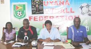 GFF general secretary, Noel Adonis flanked by tournament director Lawrence Griffith (right) and Aubrey Major (2nd left) and Charmaine Warde.