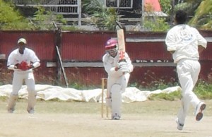 Leading from the front. Demerara Skipper Sarwan drives elegantly through cover during his top score of 31 against Essequibo yesterday.
