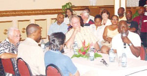 ‘Reds’ (extreme left) shares a table at the Guyana Pegasus, during one of his foundation’s events, with Roger Harper, Fazeer Mohamed, Tony Cozier & Viv Richards