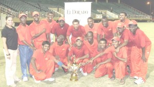 Champions Berbice celebrate their El Dorado victory with DDL’s Brands Manager Maria Munroe after they crushed Demerara by 127 runs in Saturday’s final at the Stadium.