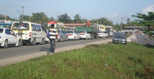 Long traffic lines on the main public road in New Diamond Housing Scheme, like this is a norm every day.