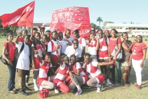 WE DID IT!!! Tutorial High School’s ‘B’ House celebrate after reclaiming the title they won in 2006 at the Police Sports Club ground, Eve Leary yesterday.