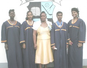 Head teacher Jennifer Rollins and four of her top students.