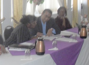 From left: UNFPA Assistant Representative Ms. Patrice La Fleur, Agriculture  Minister Robert Persaud and Dr Paulette Bynoe, Director School of Earth and  Environmental Sciences, University of Guyana, at the launching 