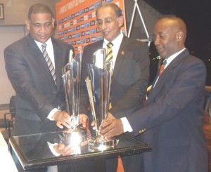 Hands on approach! The ICC & WICB have taken a hands-on approach to the hosting of next year’s 20/20 world cup in the West Indies. Here ICC’s CEO Haroon Lorgat, WICB’s CEO Earnest Hillarie and tournament Director Robert Brand pose with the 2 trophies for Kaieteur Sport on Saturday night in Barbados. 