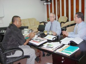 Agriculture Minister, Robert Persaud, in discussion with Senior Executive Officer of Amazon Caribbean Ltd, Denys Bourque, and Christophe Sureau, Managing Director, Amazon Caribbean Guyana Ltd. 