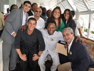  Staff members of the Brazilian Embassy enjoy a photo  opportunity with football great Edison Arantes do Nascimento. 