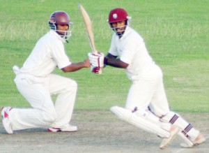 Gajanand Singh gathers runs behind square during his 79 not out at Bourda yesterday.