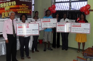 From left: CEO Deo Persaud with winners of the 2010 promotion 