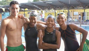 Dorado Speed Swim Club's participants at the 6th Annual Anthony Nesty  International Open and Age Group Swim Meet. From left, Niall Roberts,  Athena Gaskin, Soroya Simmons and Britany van Lange. 