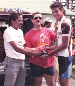 Coach Mohamed presents a prize to a thrilled youth at the National Park in 1989.