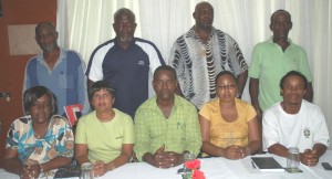 Newly elected President of the gym, Charles Roberts (seated centre) pose with coach Orlan Rogers (extreme right) and other executive members shortly after the elections.   