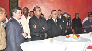 President Bharrat Jagdeo with the General Manager (right) and Director of Operations,  Americas Oguz Tayanc (at left), of the casino after the commissioning ceremony