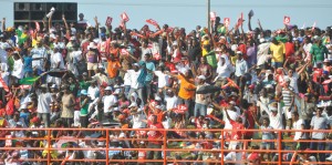 Finally something to cheer about!!! A section of the crowd in the Mound cheering the West Indies  to victory against Zimbabwe yesterday at the Providence Stadium. (Franklin Wilson photo).