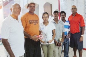 From left; President of the Lusignan Golf Club Mel Sankies, Muntaz Haniff, Christine Sukhram, Ayodha Kishore (winner) Mike Mangal and Jerome Khan (Club captain) after the presentation. 