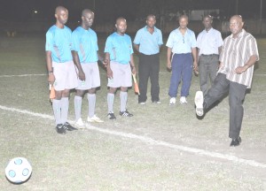 Off We Go!!! History is being recorded as Parliamentary Secretary in the Ministry of Sports Steve Ninvalle does the traditional kick off of the ball to herald the start of the First ever Twenty20 football competition. Other dignitaries and Referees savour the moment. (Franklin Wilson photo) 